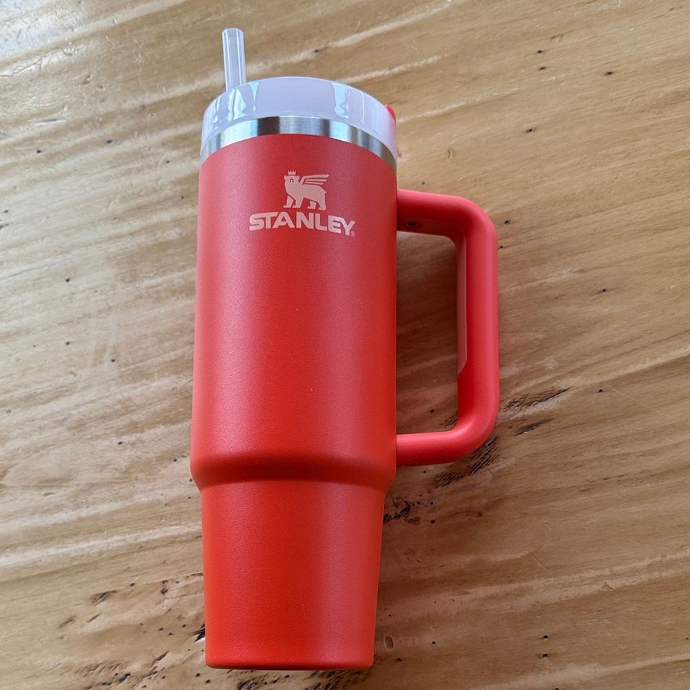 Stanley Orange Travel Mug w/handle. 30 oz